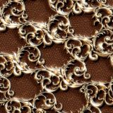 Brass-Steampunk-Scrollwork-Over-Leather.jpg